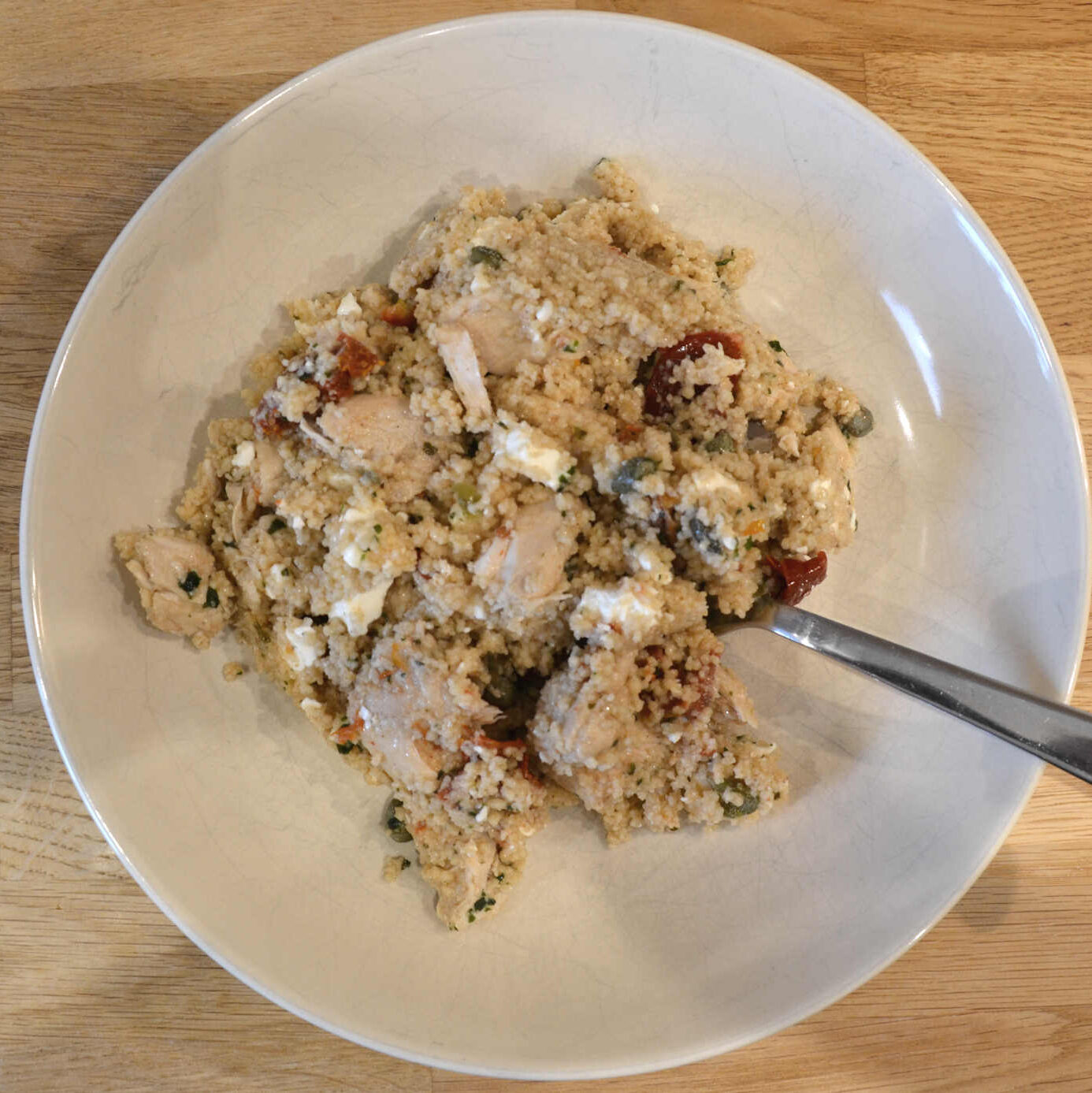 Chicken, Couscous and Feta salad, on a plate.
